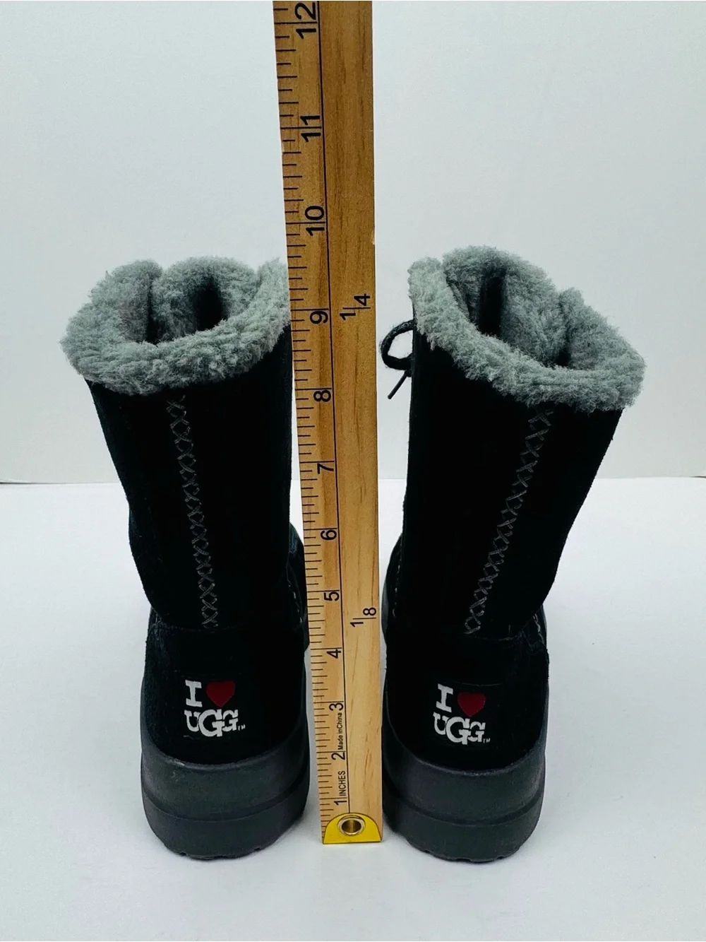 I Heart UGG Youth Black Wool Lined Boots. Size 4. Excellent preowned condition.
